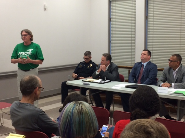 Professor Steve K. Boss of the University of Arkansas Department of Geosciences leads an Aug. 15, 2017, panel on the state's new law allowing guns on campus. The session was held at St. Paul's Episcopal Church in Fayetteville.