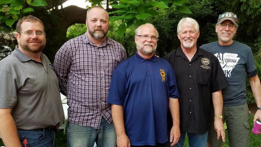 Clint Morris (from left), Donald McKinney, Bruce Appel, Alan Hughes and Hershey Garner pose May 31, 2018, at the annual barbecue of the Northwest Arkansas Labor Council, held at Martin Law Firm in Fayetteville.