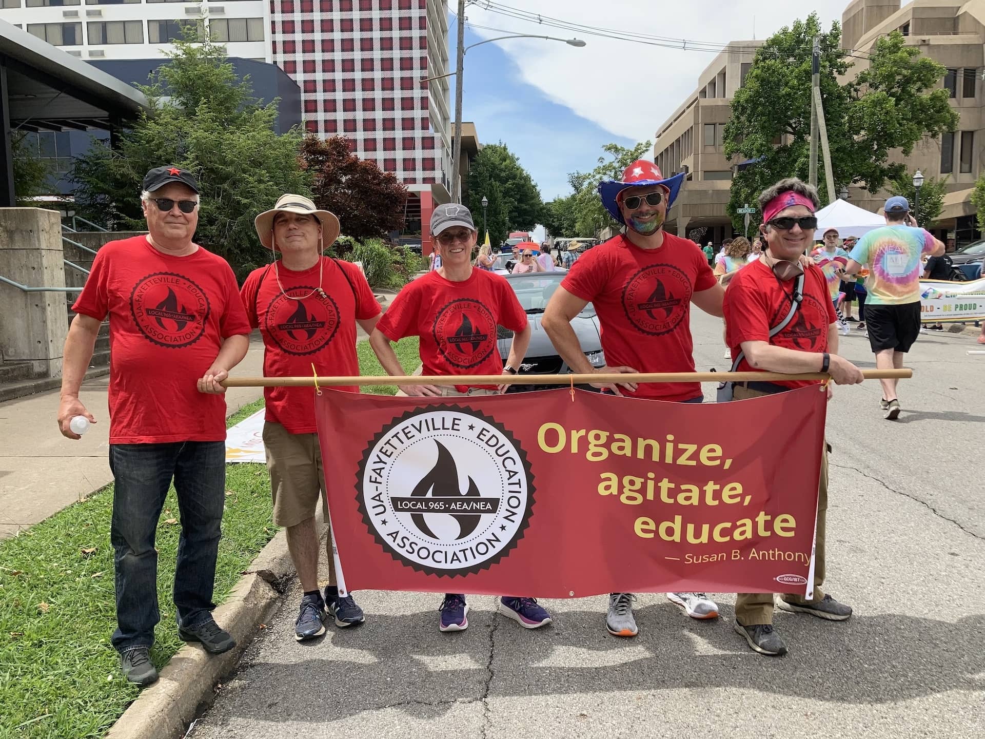 Local 965 members Ted Swedenburg, Mike Pierce, Tricia Starks, Bret Schulte and Ben Pollock form up June 26, 2021, shortly before the start of the 17th annual Northwest Arkansas Pride Parade in Fayetteville.