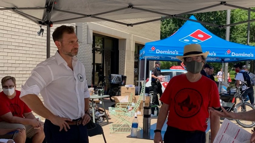 Local 965 President Bret Schulte and 965 Secretary Ben Pollock meet with students at the Aug. 25, 2021, Razorbash information fair on the Fayetteville campus.