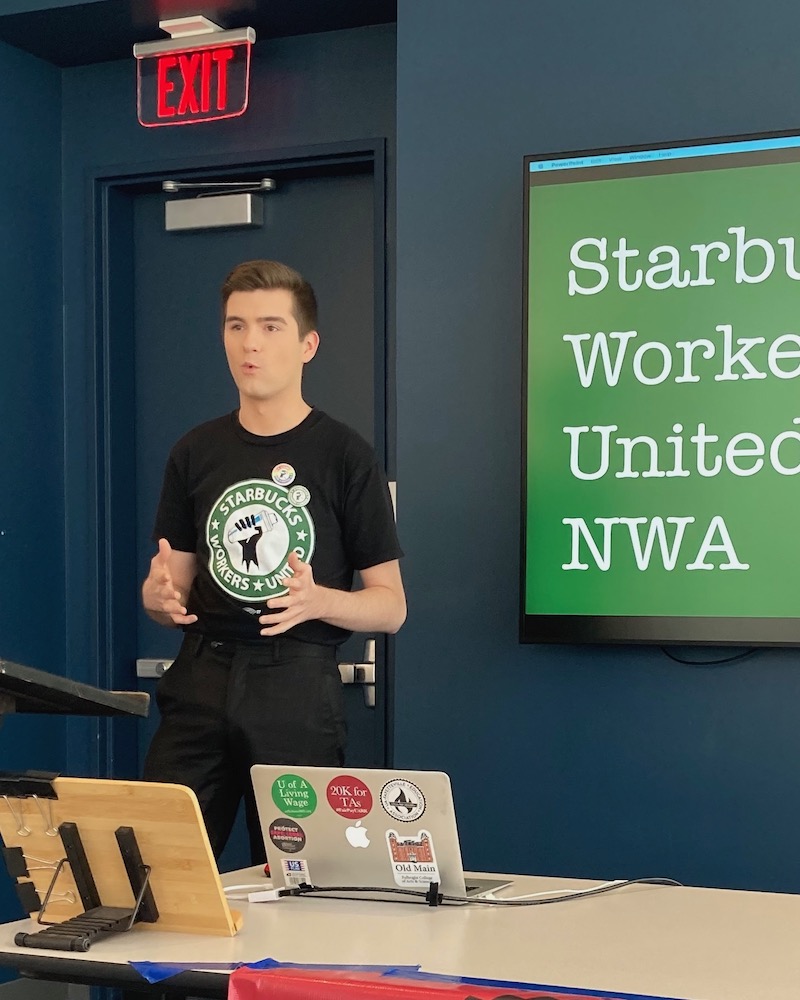 Dylan Hartsfield, an organizer with Workers United Starbucks who began with the coffee shops in Northwest Arkansas, speaks at the April 8, 2023, NWA Labor Spring Teach-In at the Fayetteville Public Library.