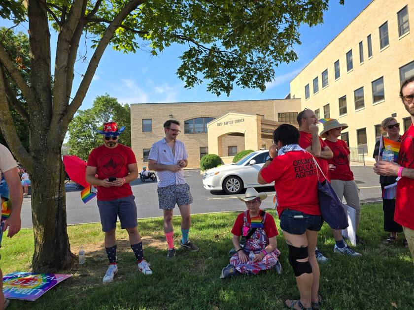 Members of Local 965 savor the shade before the 2024 NWA Pride Parade June 29.