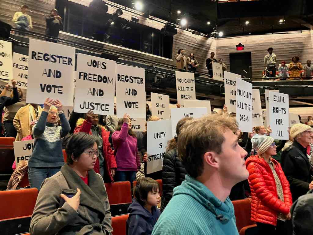 Members of Local 965 were among a couple hundred observing the indoor Freedom March Monday, Jan. 20, 2025, at Fayetteville's Theatre Squared.