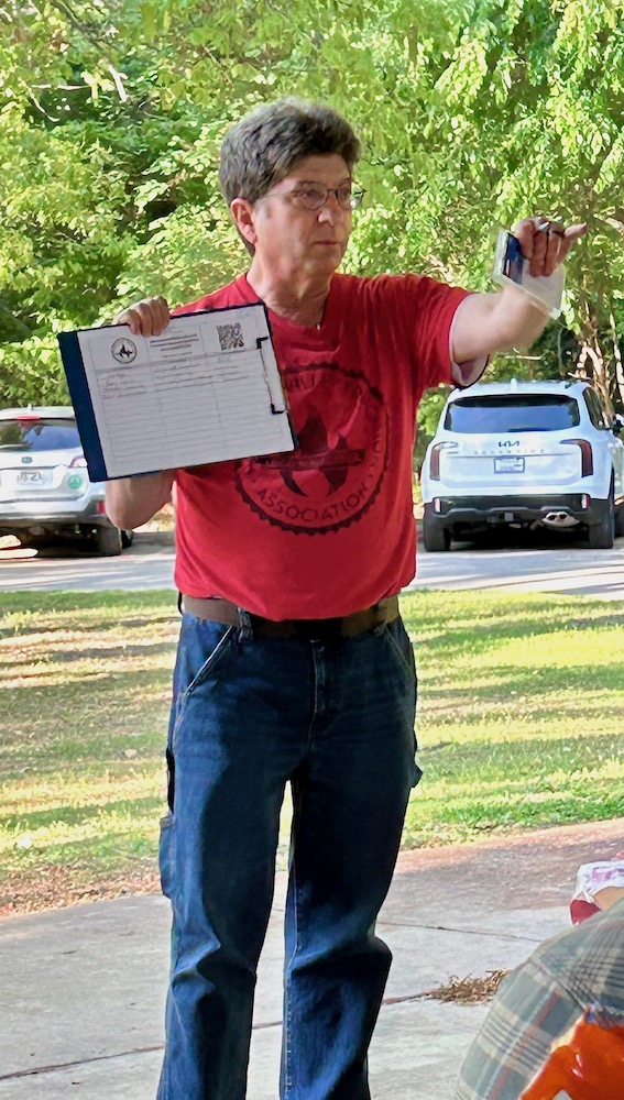 Ben Pollock asks picnickers to sign up for the mailing list