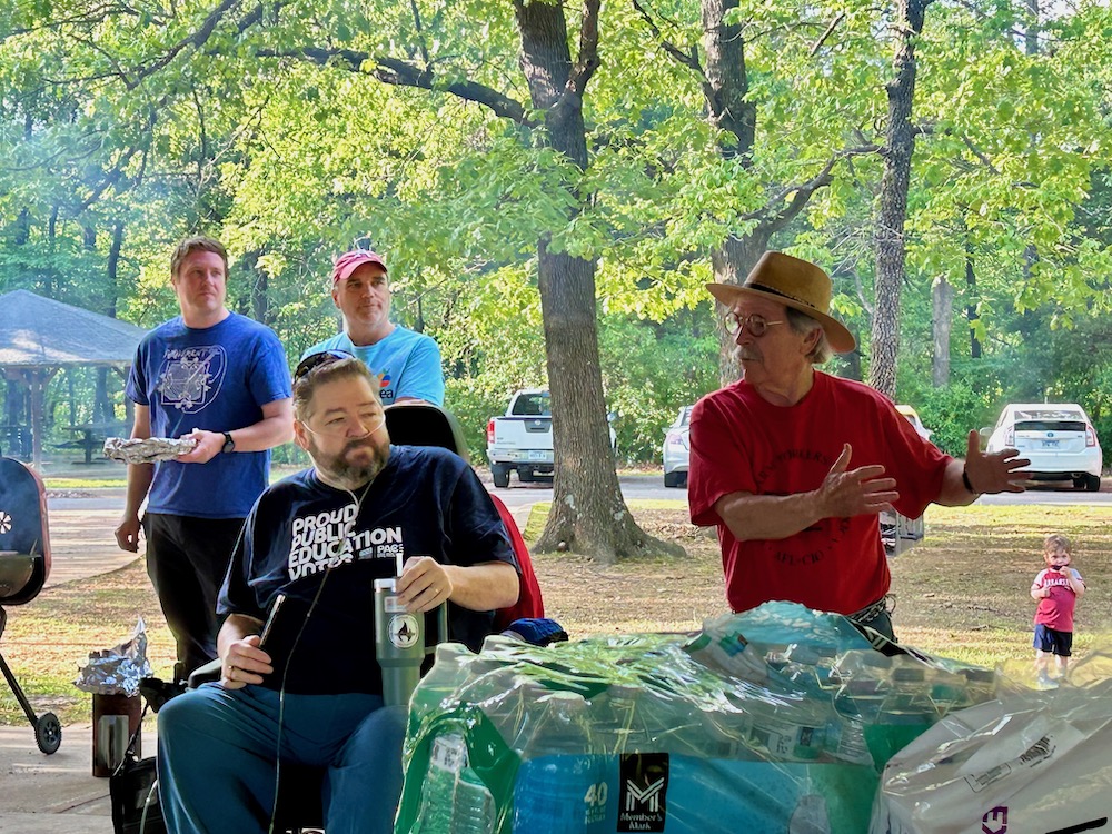 Walter Hinojosa speaking to three.