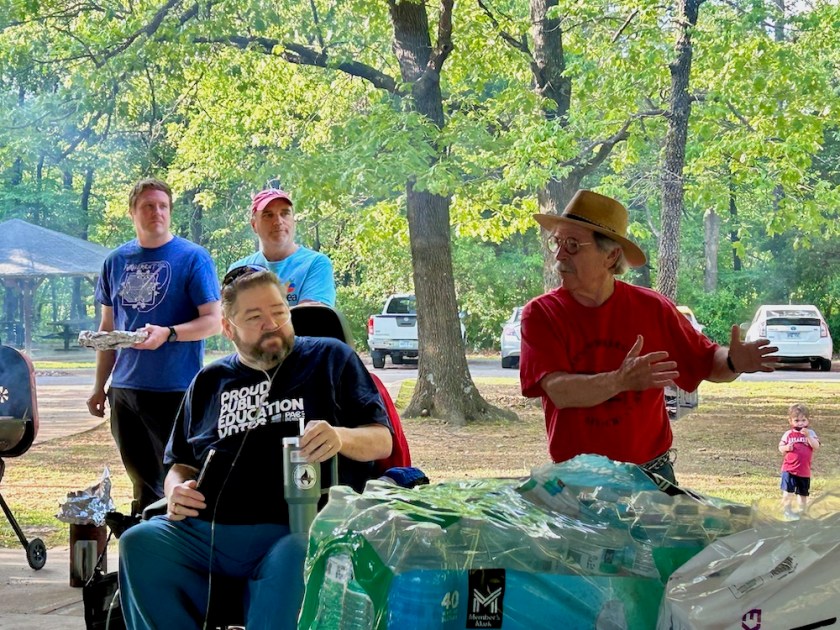 Walter Hinojosa speaking to three.