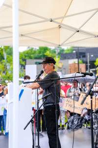Walter Hinojosa, president of the NWA Central Labor Council, addresses the Fayetteville, Arkansas, No Kings Day of Defiance rally Saturday, June 14, 2025.